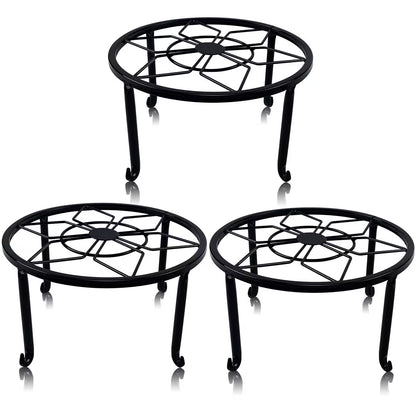 Sturdy black wrought iron stand, suitable for indoor and outdoor use.
