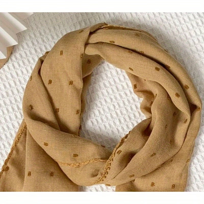 Polka-dot silk scarf—a stylish and versatile small square scarf.