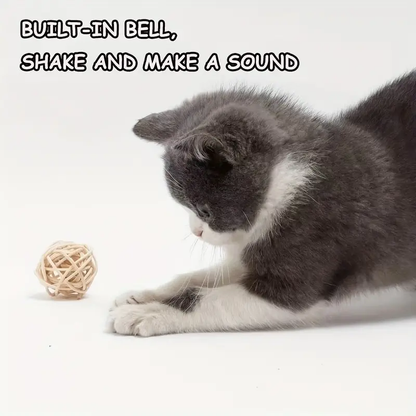 Two cat toy balls made of synthetic feathers, designed for teasing and chewing.