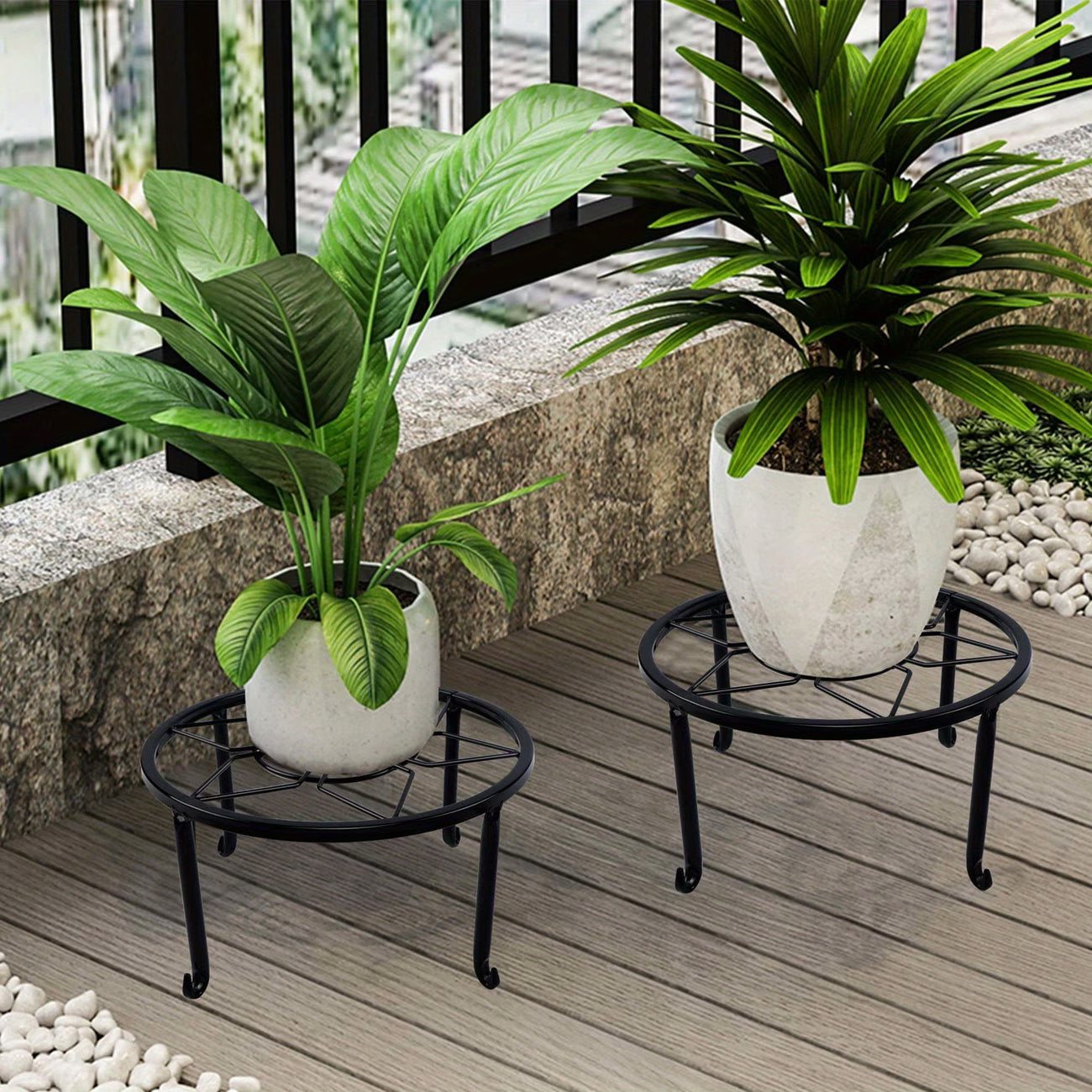 Sturdy black wrought iron stand, suitable for indoor and outdoor use.