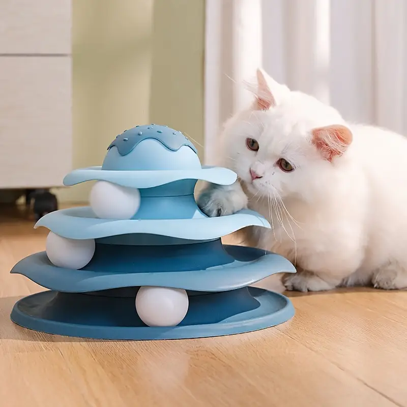 Three-tiered cat-themed spinning toy, interactive track tower, educational game.