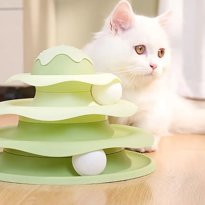 Three-tiered cat-themed spinning toy, interactive track tower, educational game.