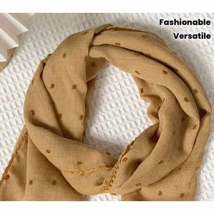 Polka-dot silk scarf—a stylish and versatile small square scarf.