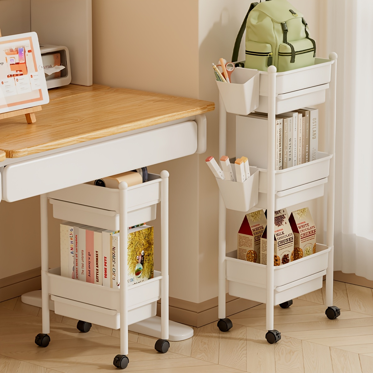 Three-tiered bookshelf with wheels, and includes two pen holders.