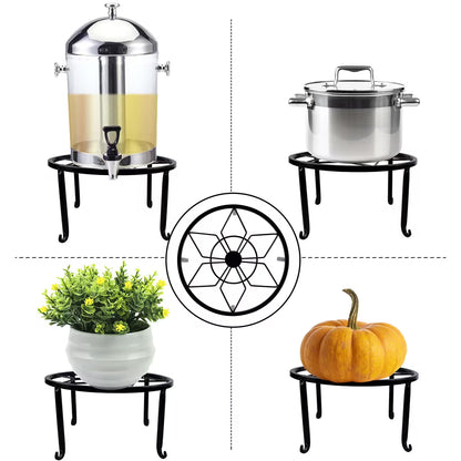 Sturdy black wrought iron stand, suitable for indoor and outdoor use.