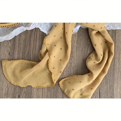 Polka-dot silk scarf—a stylish and versatile small square scarf.