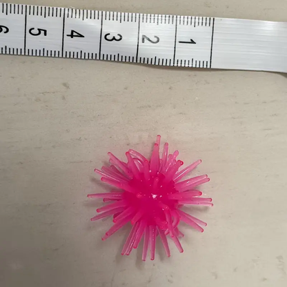 12-pack of interactive cat toy balls with suction cups, wall-climbing, made of rubber.