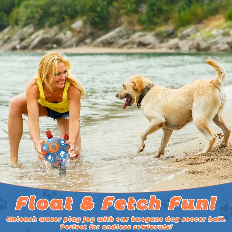 Large, thickened rubber dog soccer ball with tug-of-war straps and inflation tube.
