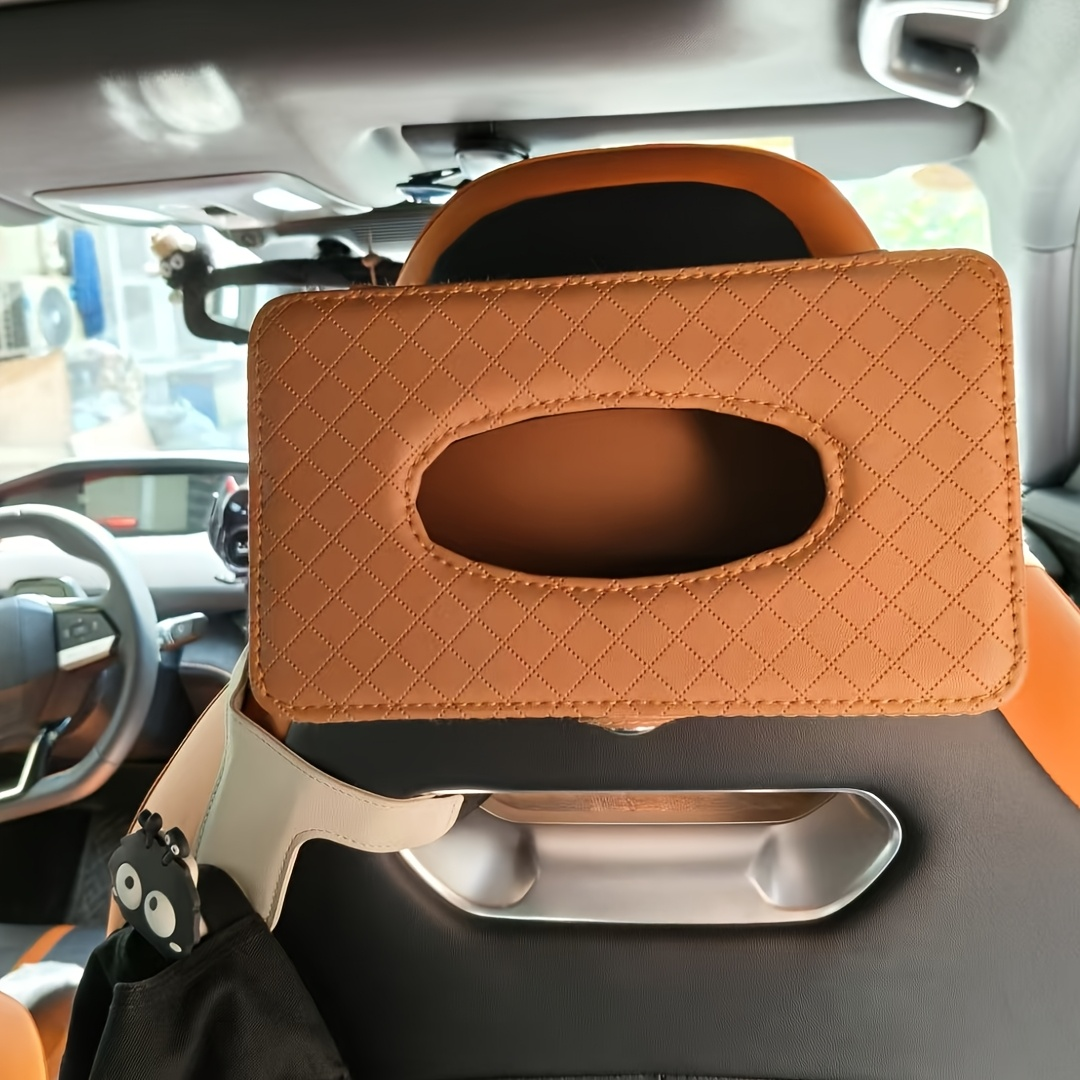 One car-mounted, grid-style tissue box with a hanging strap, made of PU leather.
