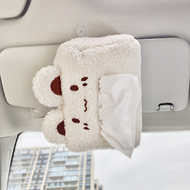 A hanging car tissue box with a cute and creative design.