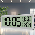 Large digital wall clock with temperature, date, and daylight saving time display