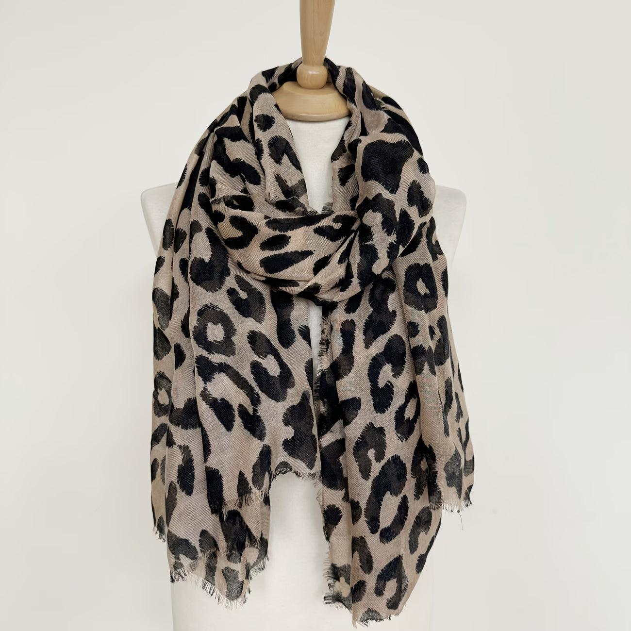 Women's leopard-print scarf—stylish and elegant.