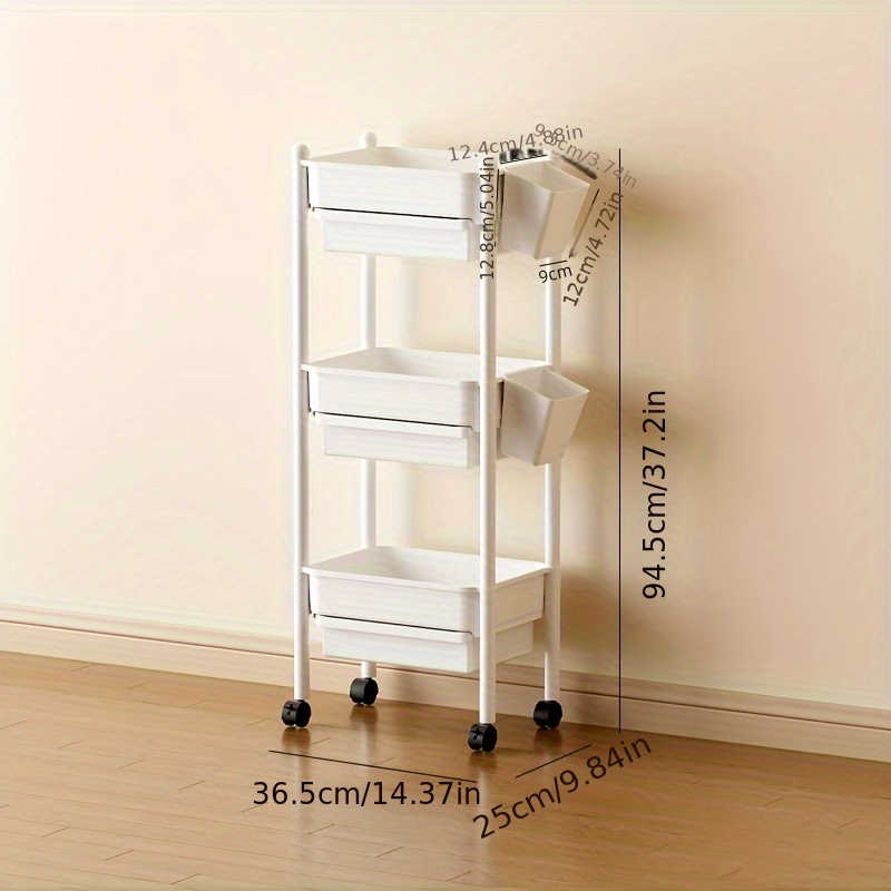 Three-tiered bookshelf with wheels, and includes two pen holders.
